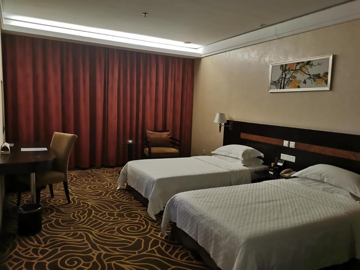 Hua Shi Hotel Гуанчжоу Екстер'єр фото