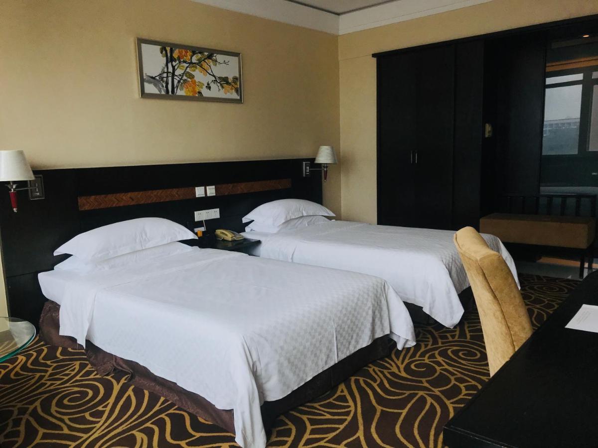 Hua Shi Hotel Гуанчжоу Екстер'єр фото